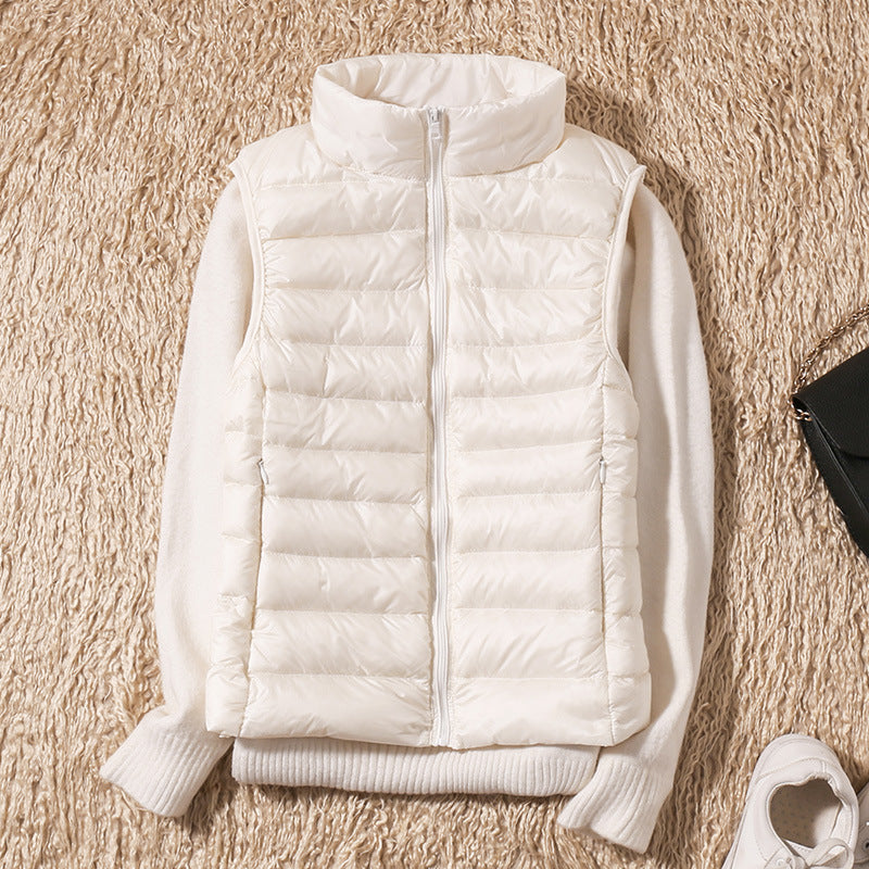 Amira™ | Lätt fjäderväst med plisserad design