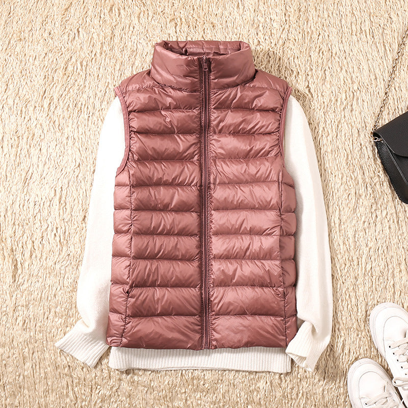 Amira™ | Lätt fjäderväst med plisserad design